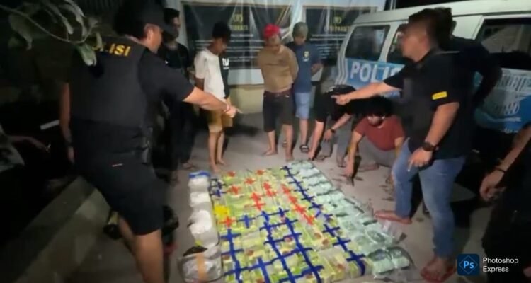 Dua tersangka, YNP (30) dan SB (59), ditangkap dengan barang bukti 80 kg sabu dan 50 ribu butir ekstasi. (Ist)