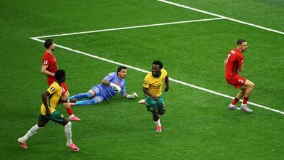 soccer-worldcup-aus-tur-1781414435163_169 (1) Selebrasi pemain Australia Nestory Irankunda usai cetak gol. (REUTERS/Agustin Marcarian)