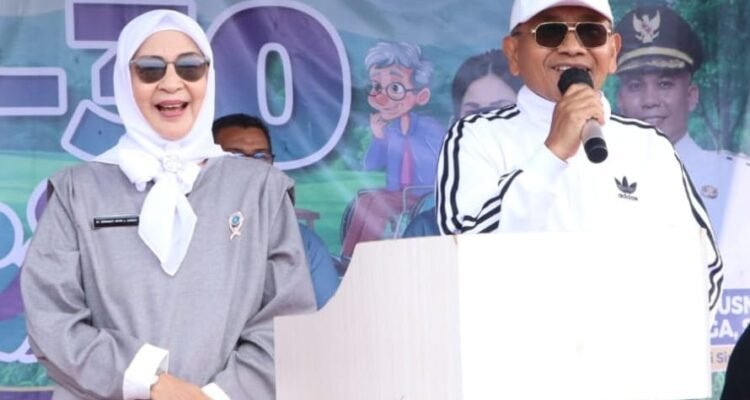 Bupati Simalungun Anton Achmad Saragih bersama Ketua TP PKK Simalungun Darmawati. Foto: arsip Dinas Kominfo Simalungun